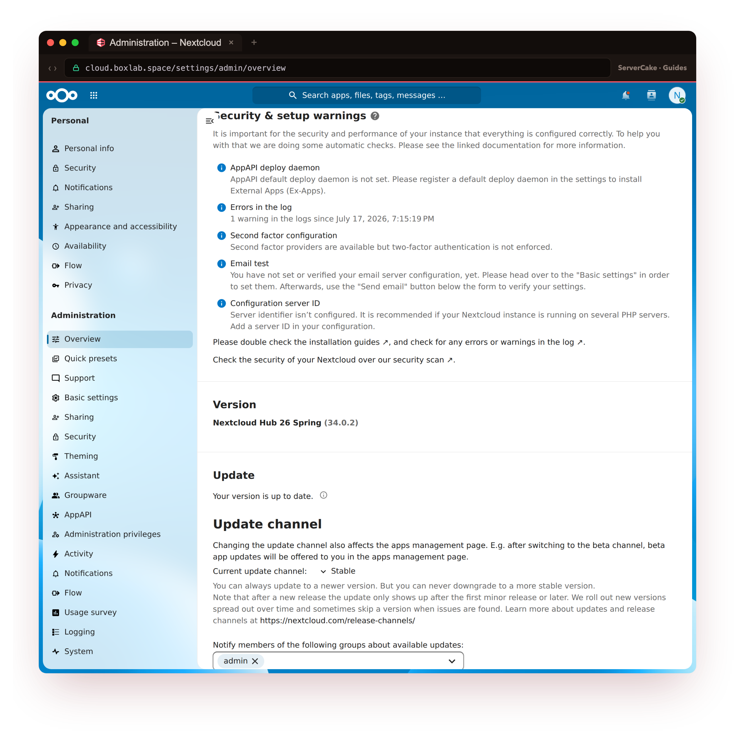 The genuine Nextcloud 34.0.2 admin Overview at cloud.boxlab.space after tuning, the Security and setup warnings section with the memory cache, file locking, cron and PHP getenv warnings all cleared, only optional informational notes remaining, and the version panel showing 34.0.2 up to date, the payoff over real HTTPS